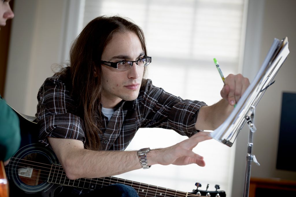 Danton, labeling a student's score in a guitar les