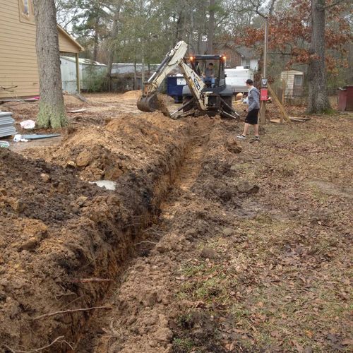 Trenching for water line on new construction of ho