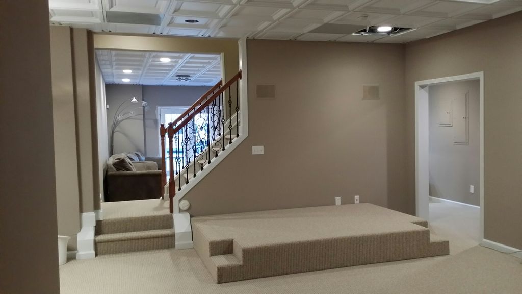 Basement pic with removable theatre seating base.