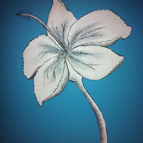 White Hibiscus on wall of teens bedroom.