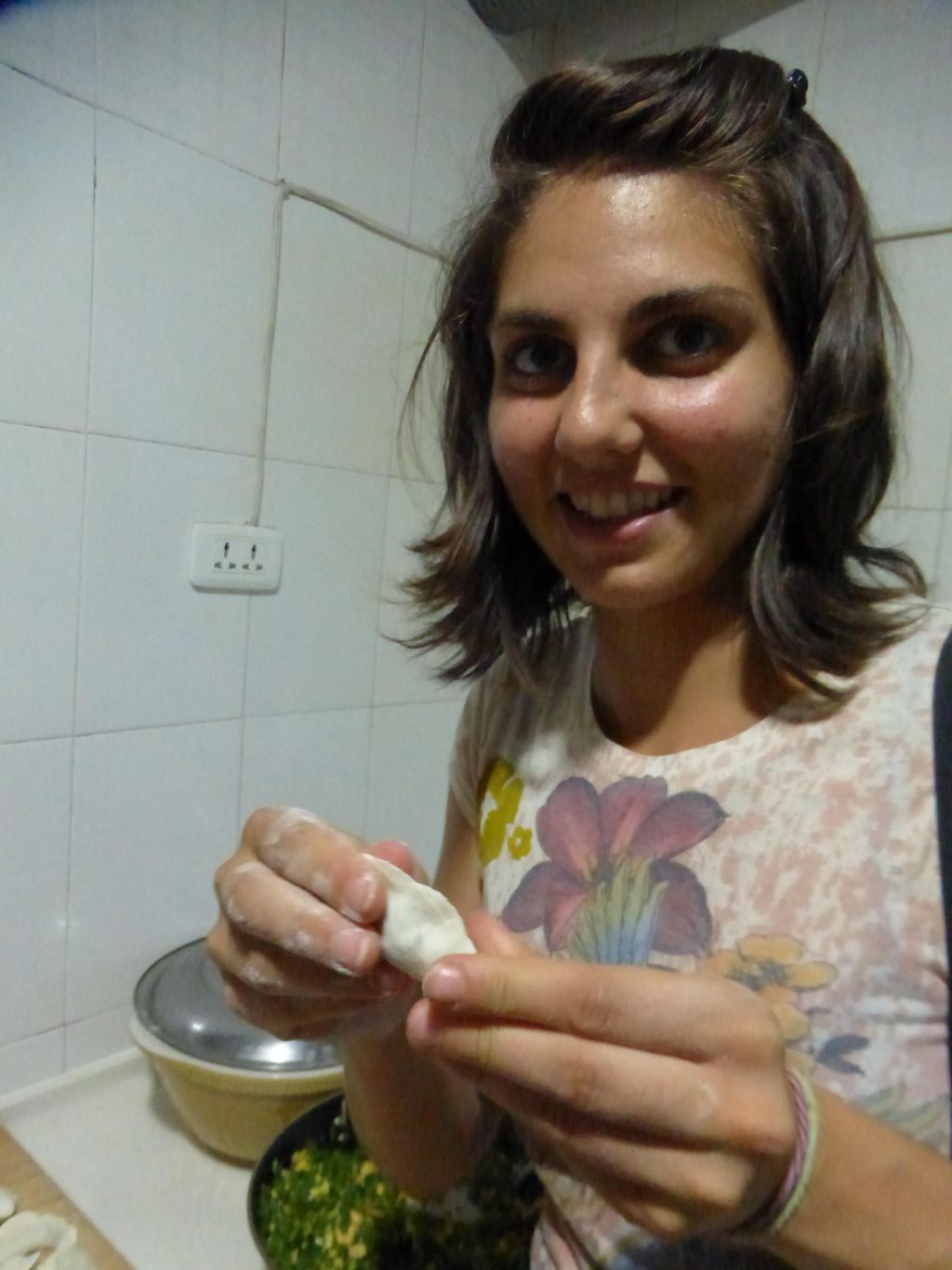 Learning to wrap dumplings in China