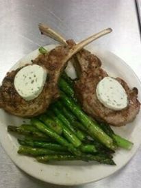 Grilled Veal Chops compass butter and Sauteed aspa