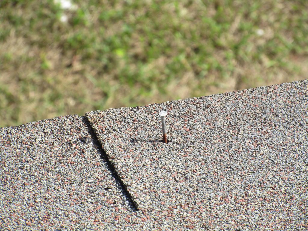 Exposed nails on roof