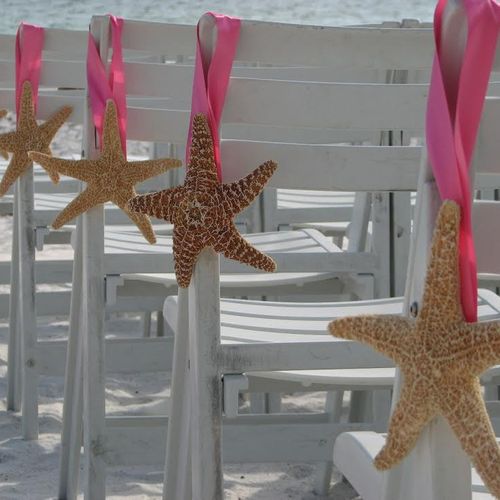 Tropical themed aisle decor. Ribbon can be changed