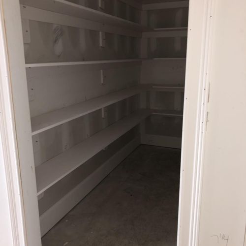 Pantry shelf installation on new home