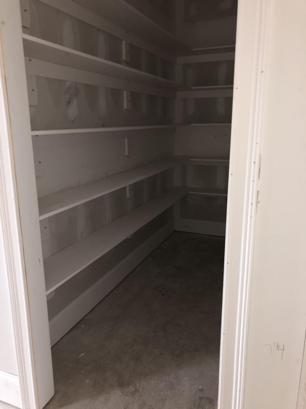 Pantry shelf installation on new home