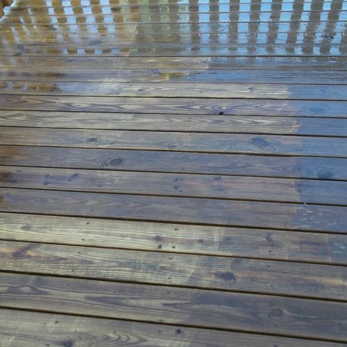Deck while cleaning it to prepare for staining