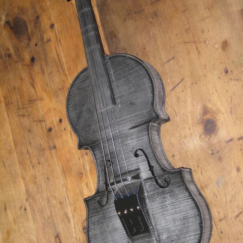 3D Printed Violin. 
Design attribution to Hovalin.