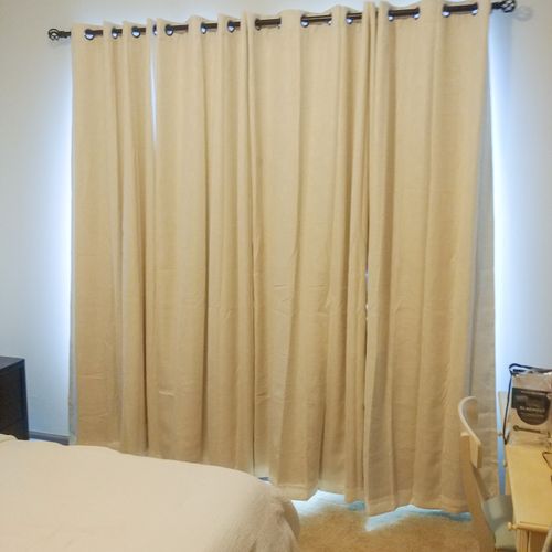 Adjustable Curtain Rod And Curtains Hung