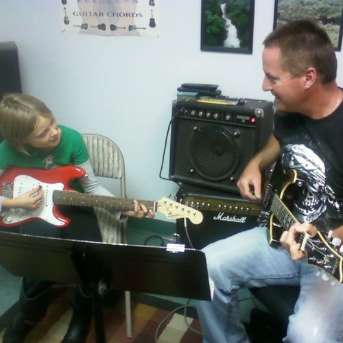 Guitar teacher Doug Wilmarth teaches in one of Cal