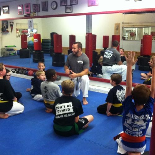 Teaching self-defense karate to my students. (2016
