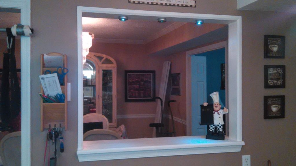 Built breakfast bar window in kitchen.