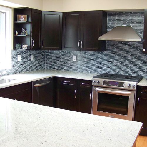 Cabinets, Granite countertop, and tile work.