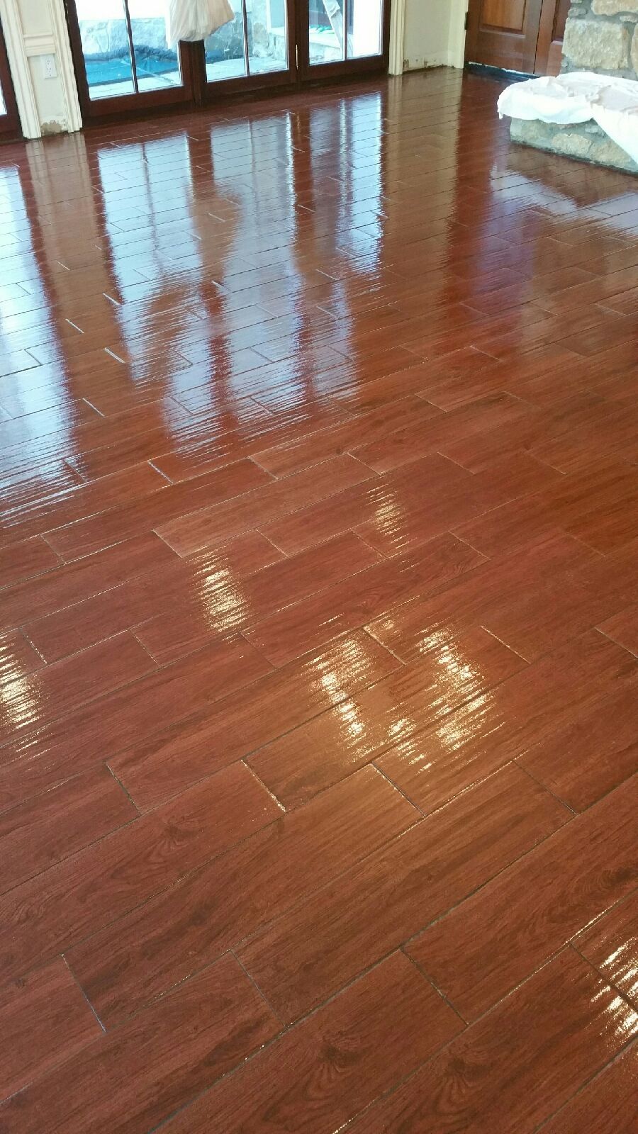 Wood looking ceramic tiles installed in customer's