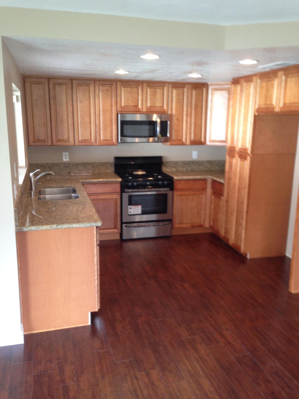 Completed kitchen remodel and recessed lighting in