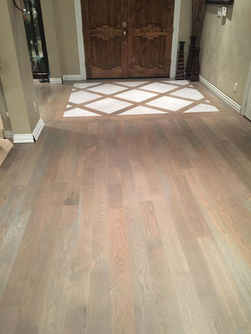 Entry Lattice.  3000sqft 5” oak installed and fini