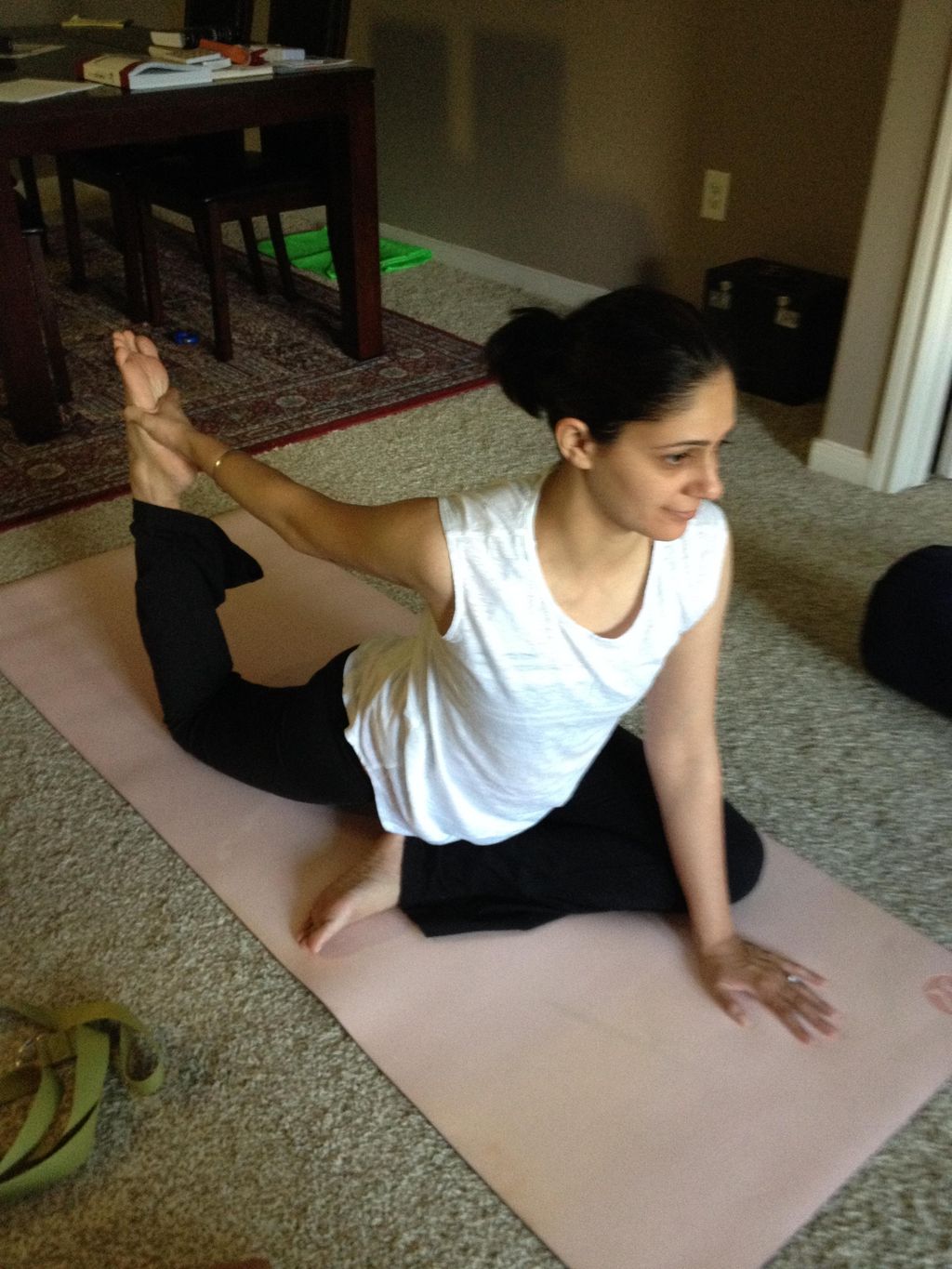 A client in Pigeon Pose.