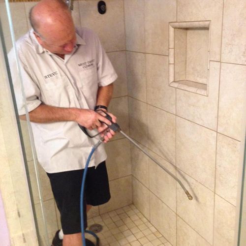 Shower stall tile cleaning