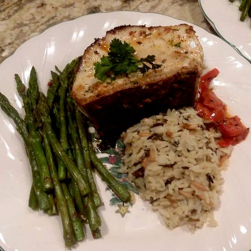 Chilean Sea Bass with wild rice and grilled aspara