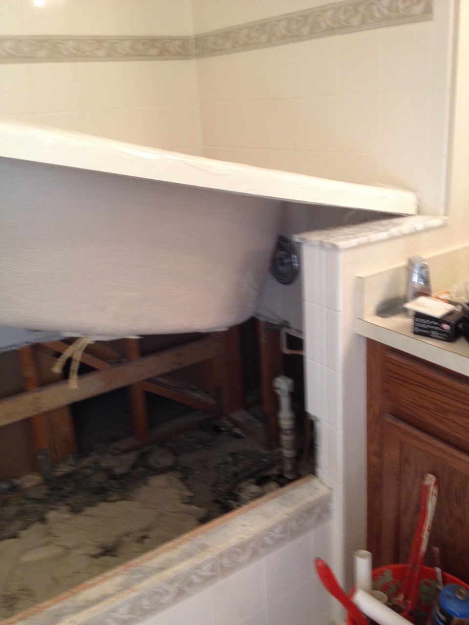 Even though the new tub didn't fit like the home o