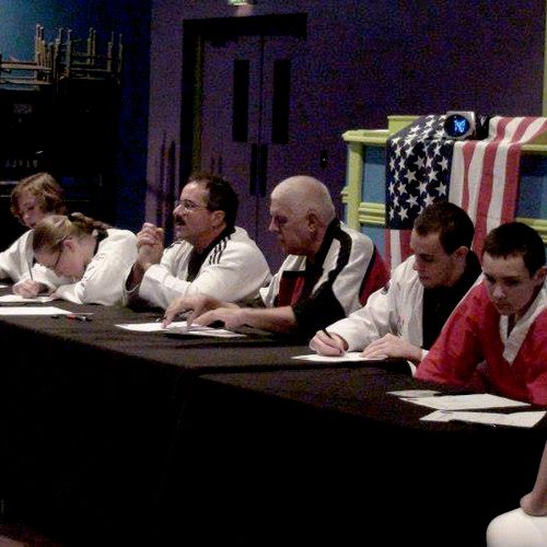 "Belt Testing" Panel of judges grading student per