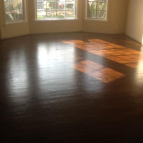 Floor refinished after a flood caused by a broken 