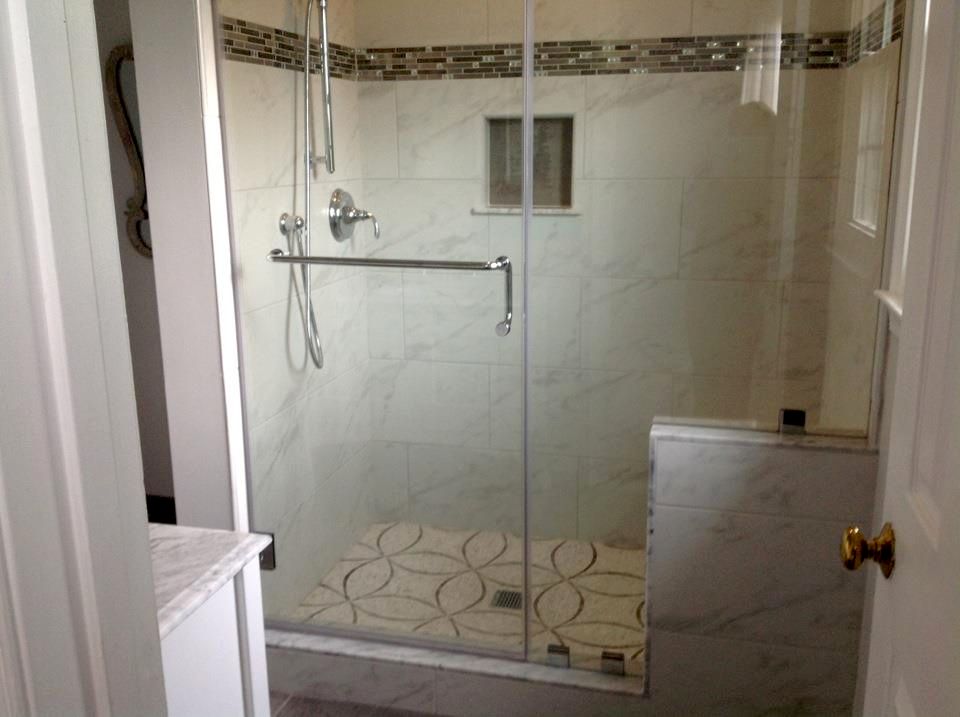 Removed bathtub and installed custom tiled shower 