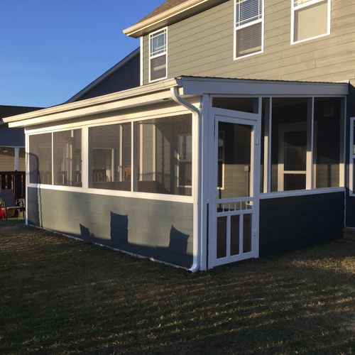 enclosed and screened in matching porch.