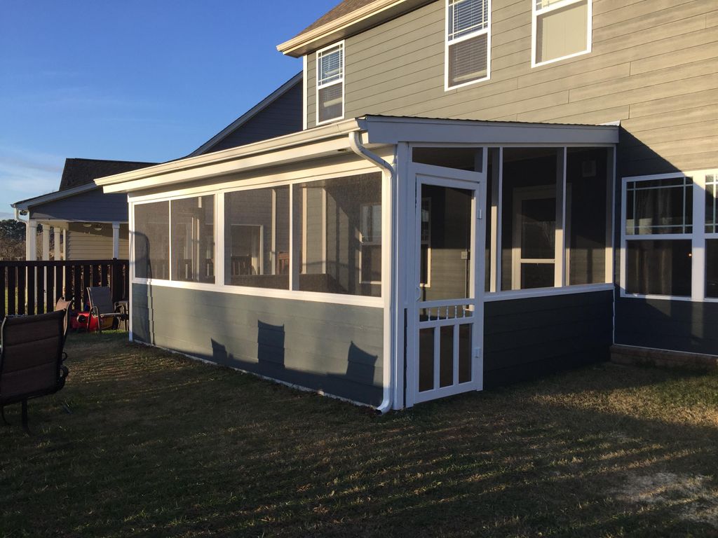 enclosed and screened in matching porch.