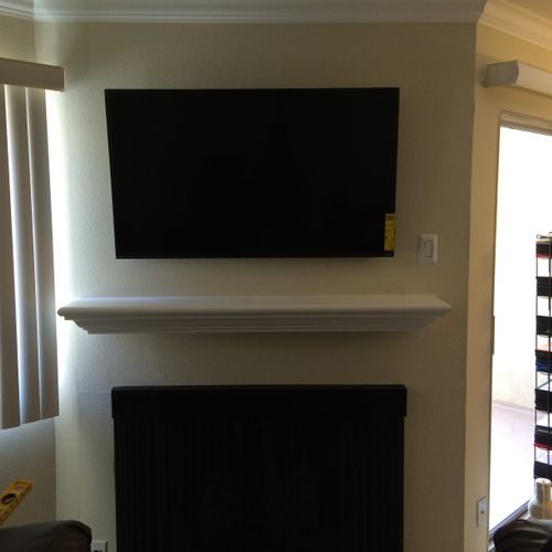 This is a 50" TV installation with a tilt mount.