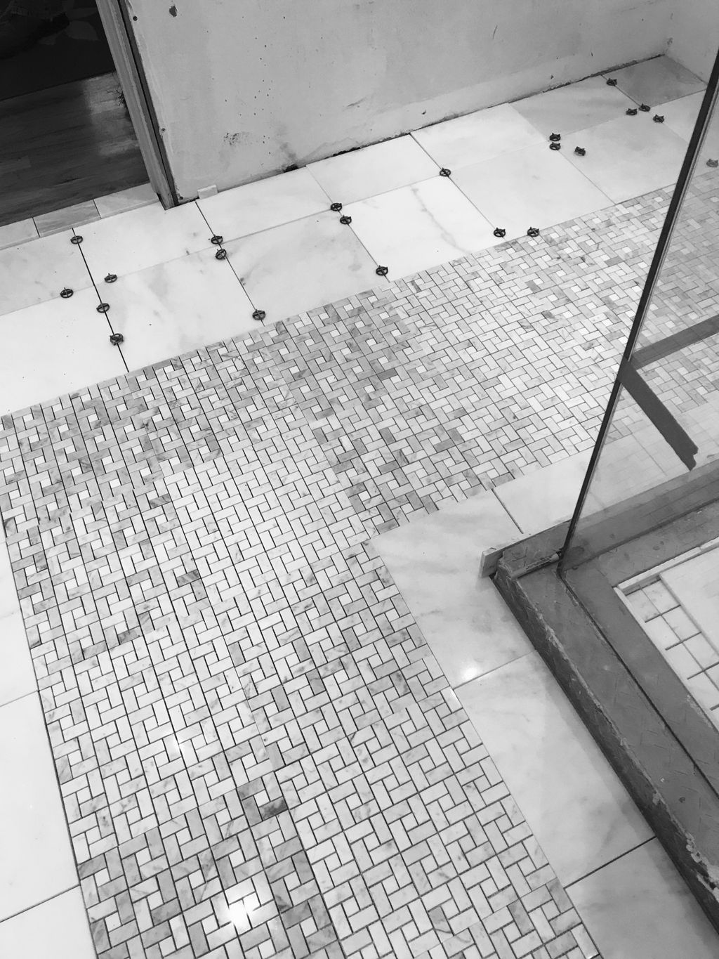 Carter’s marble bath underway. Basket weave floor 