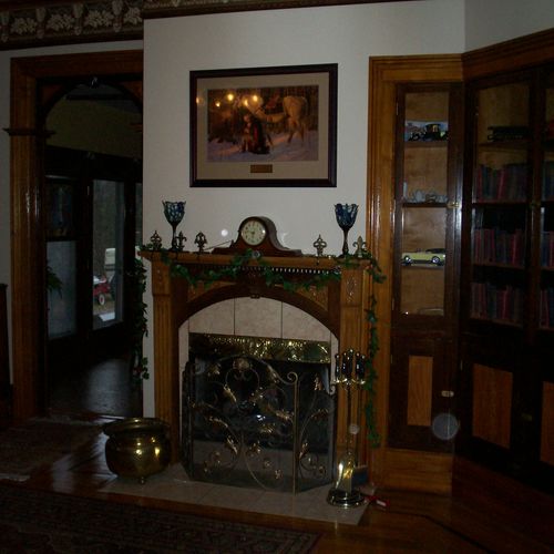 built cabinets and fireplace mantel