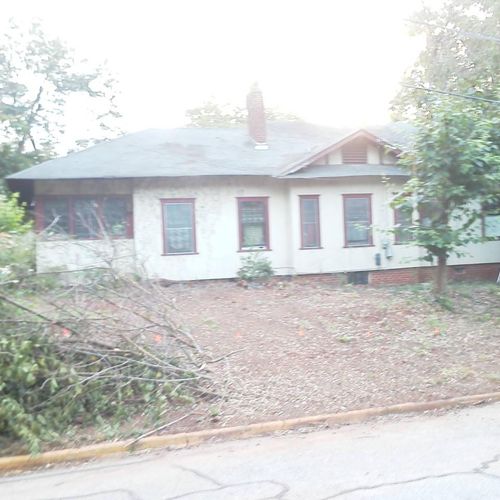 A Storm knocked a tree onto this 1920s home. We re