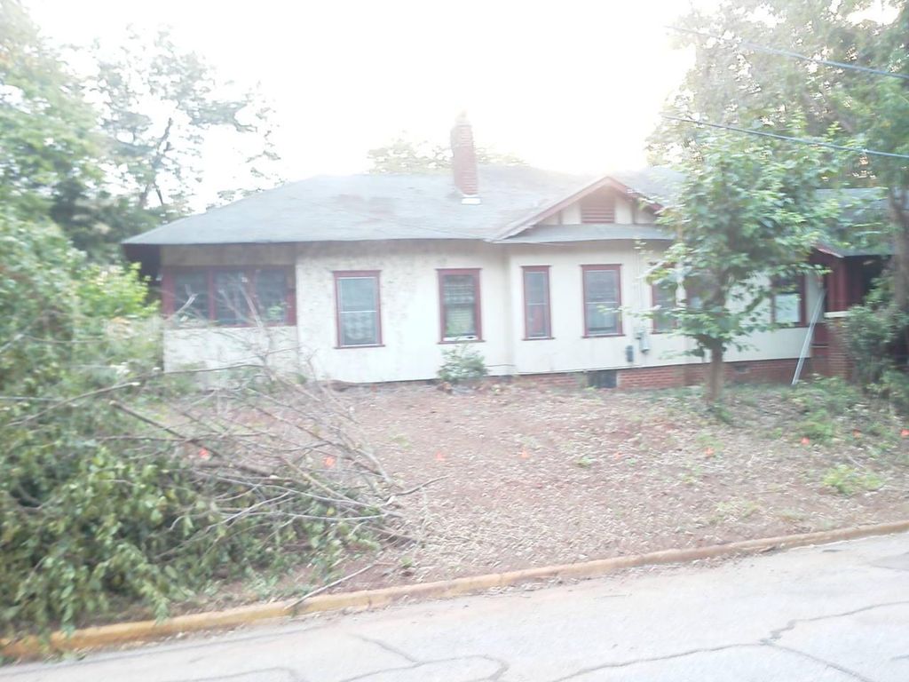 A Storm knocked a tree onto this 1920s home. We re