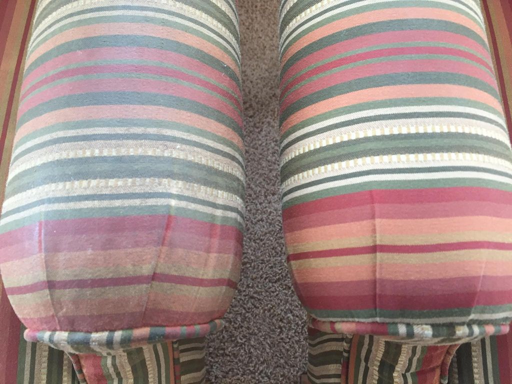 Upholstery cleaned & brightened. 