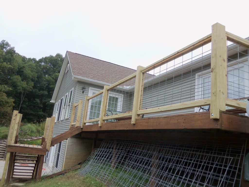 Installed hand rails using welded wire panels
