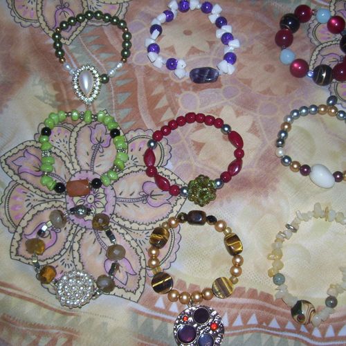 all kinds of bracelets with glass beads, amethyst,