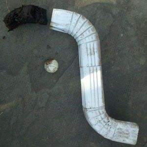 Clogged down spouts are cleared so the entire syst