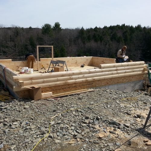 we build log cabins