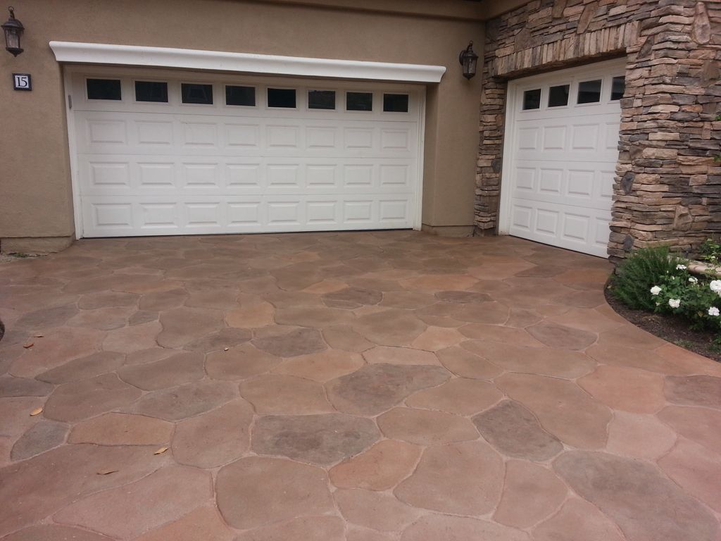 Old faded stamp concrete re-stained