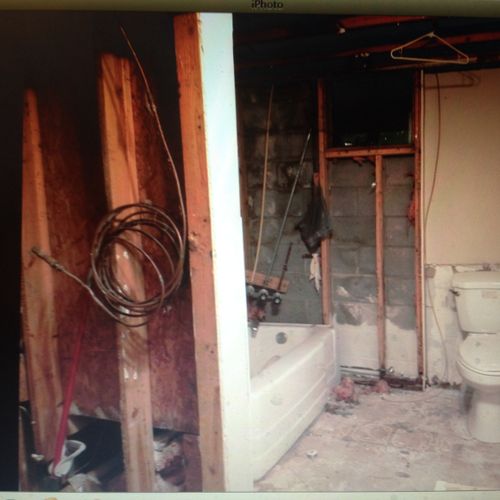 Before picture of a basement bathroom