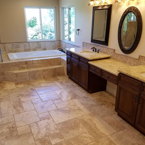 Custom Natural Stone Tile Bathroom Remodel.