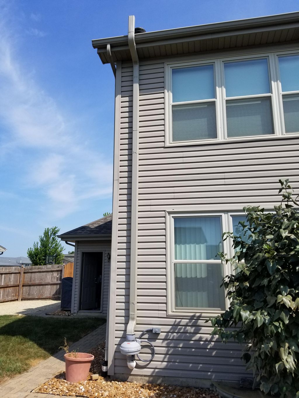 Exterior Installation with Color Match Down Spout