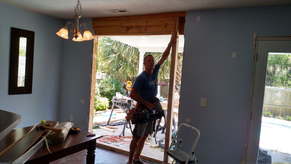 Replacing French doors with new wall and window