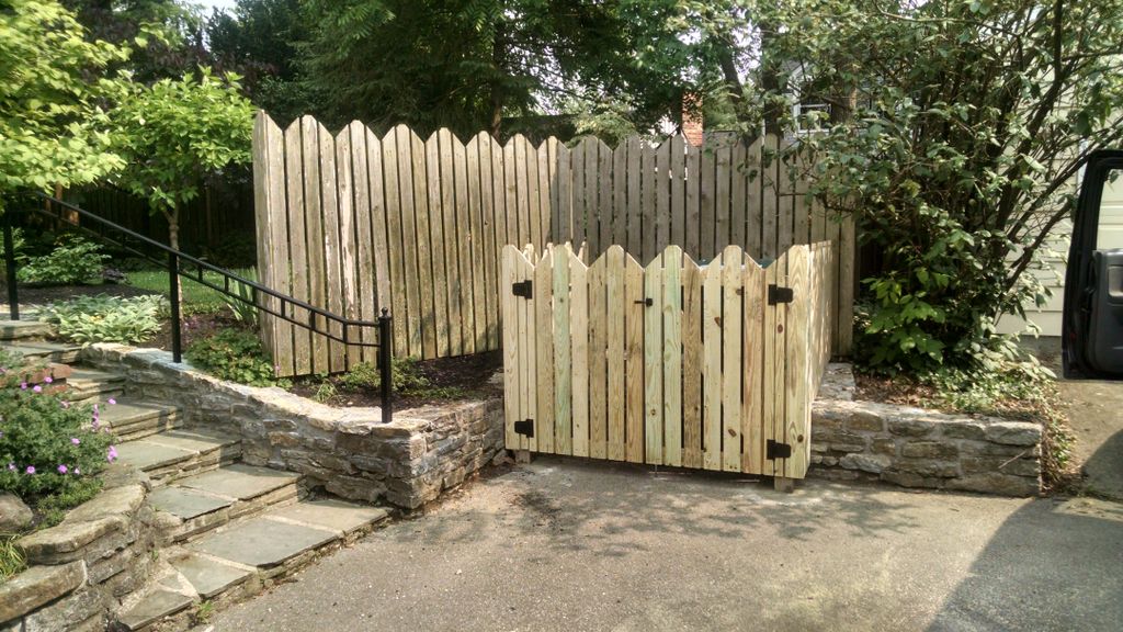 A CUSTOM GARBAGE/ RECYCLING CAN CORRAL IN HYDE PAR