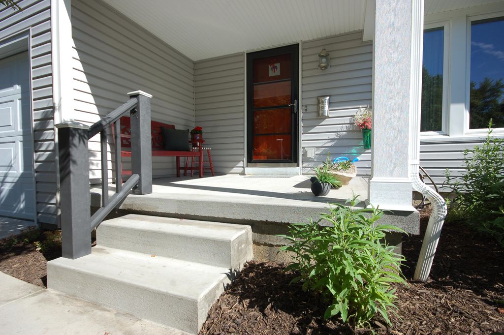 Removal of old concrete porch. Poured new concrete