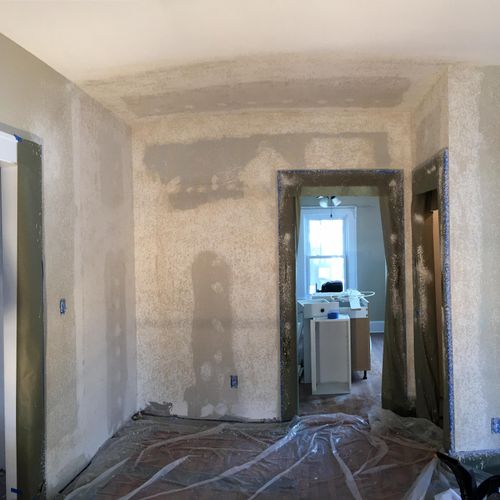 DURING drywall install and texturing new wall