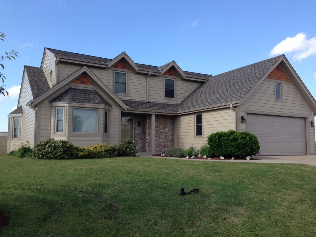 On this house we installed LP SmartSide siding, Sh