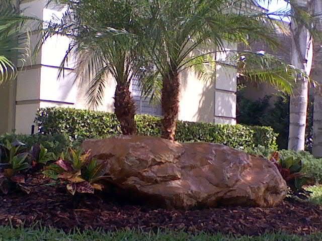 1200lbs river rock and plants installed in Villa R