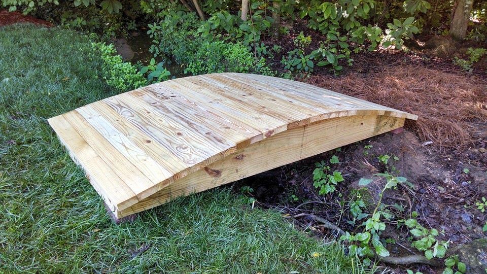 Arched foot bridge custom designed and constructed